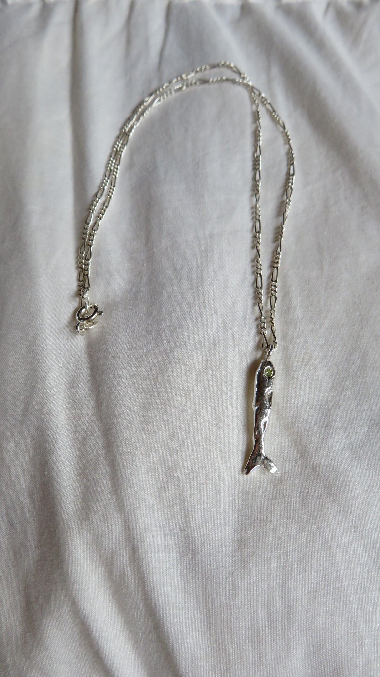 The fish charm necklace