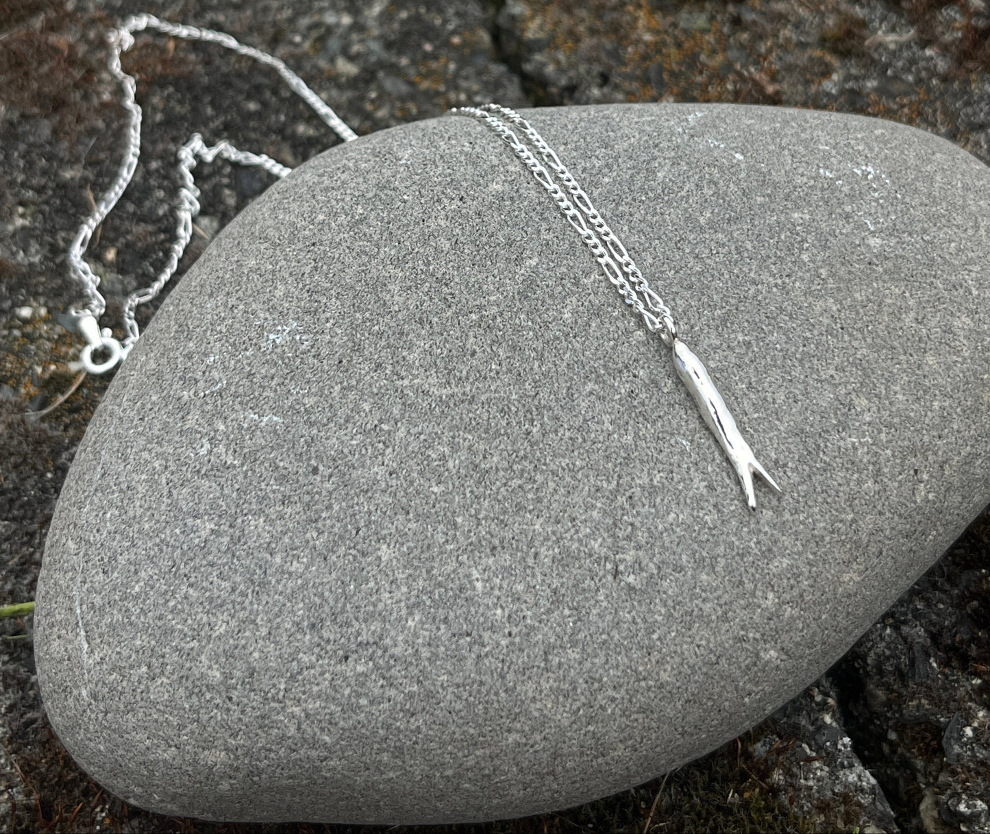 The fish charm necklace