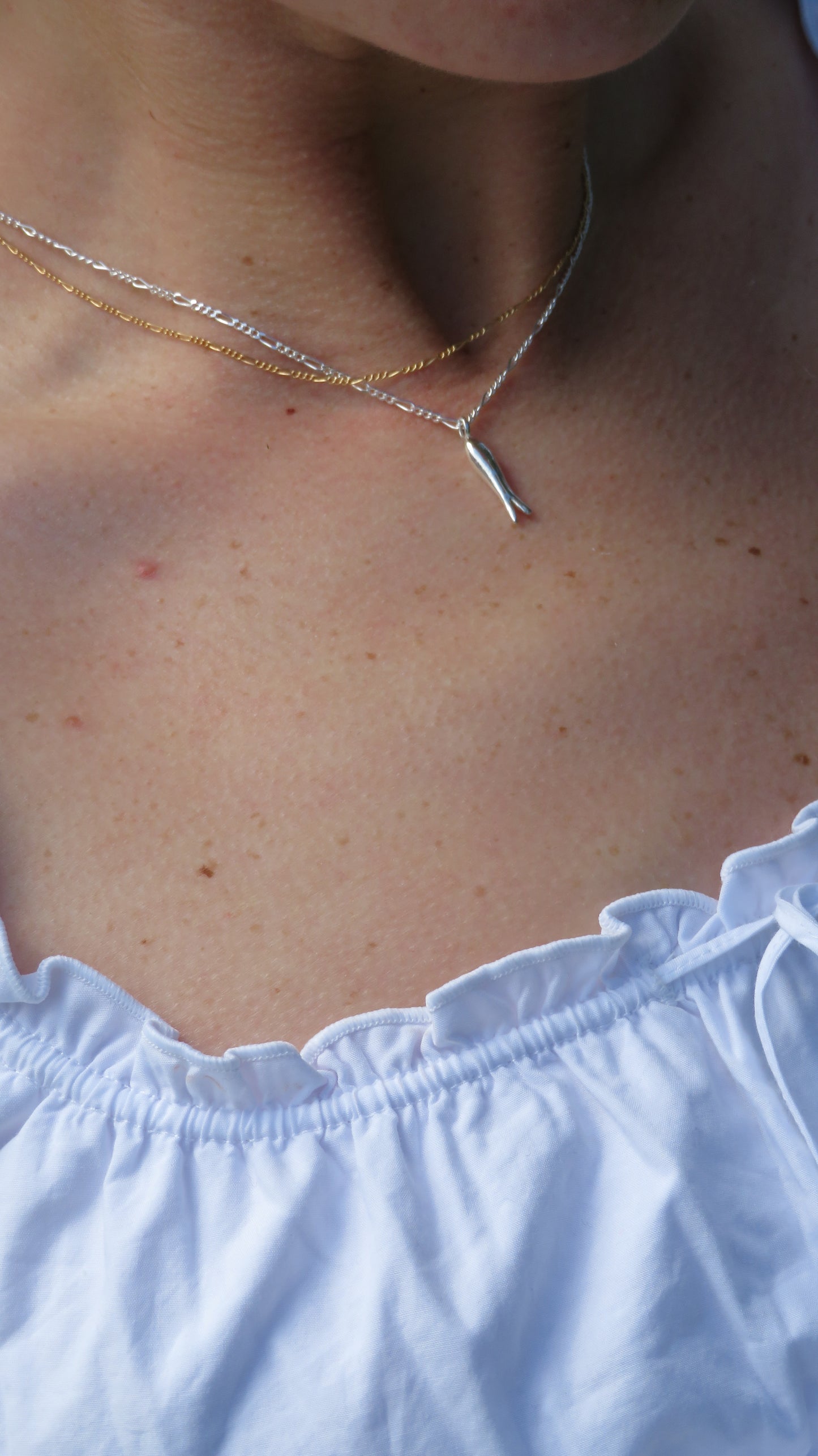 The fish charm necklace