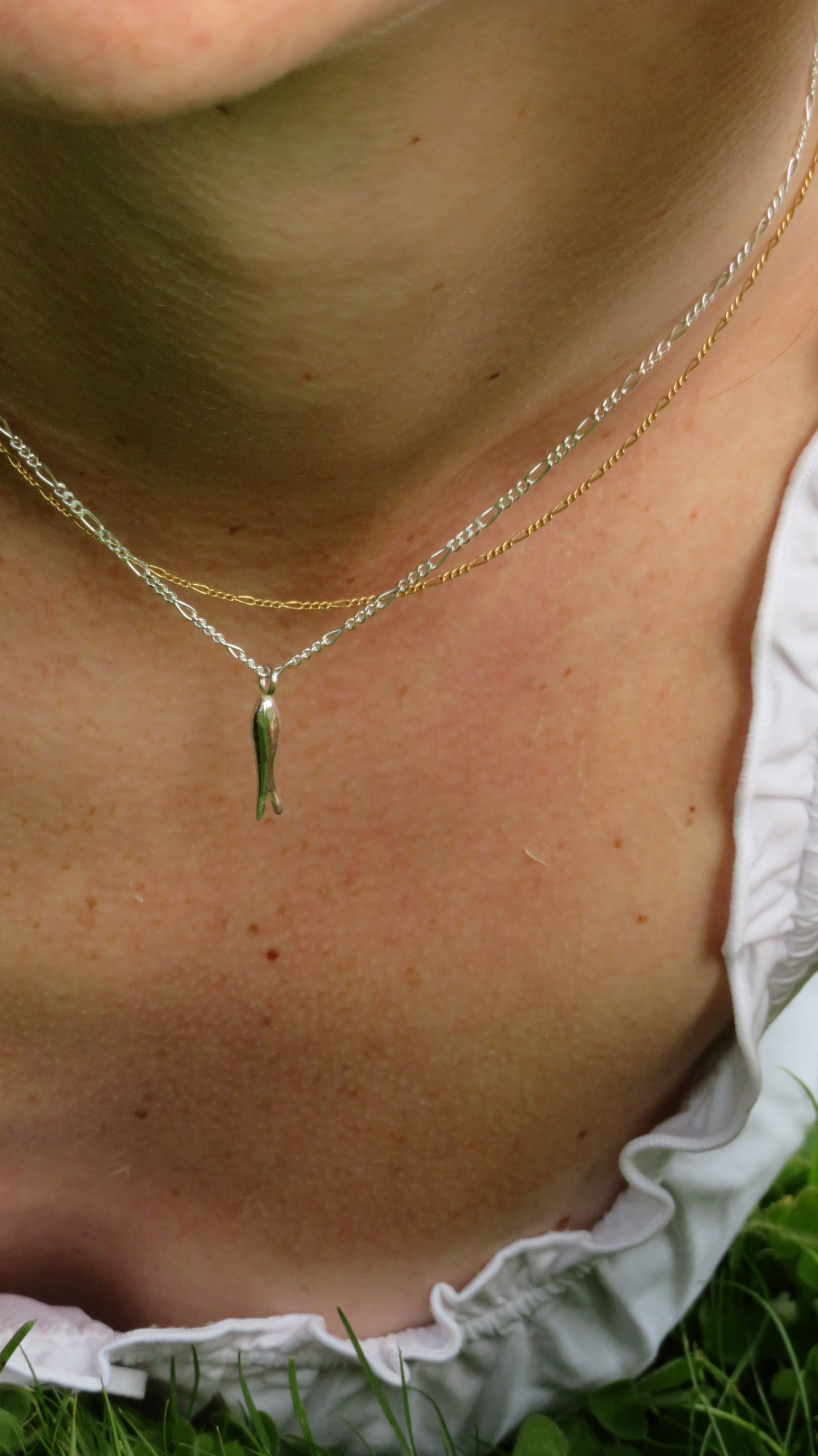The fish charm necklace